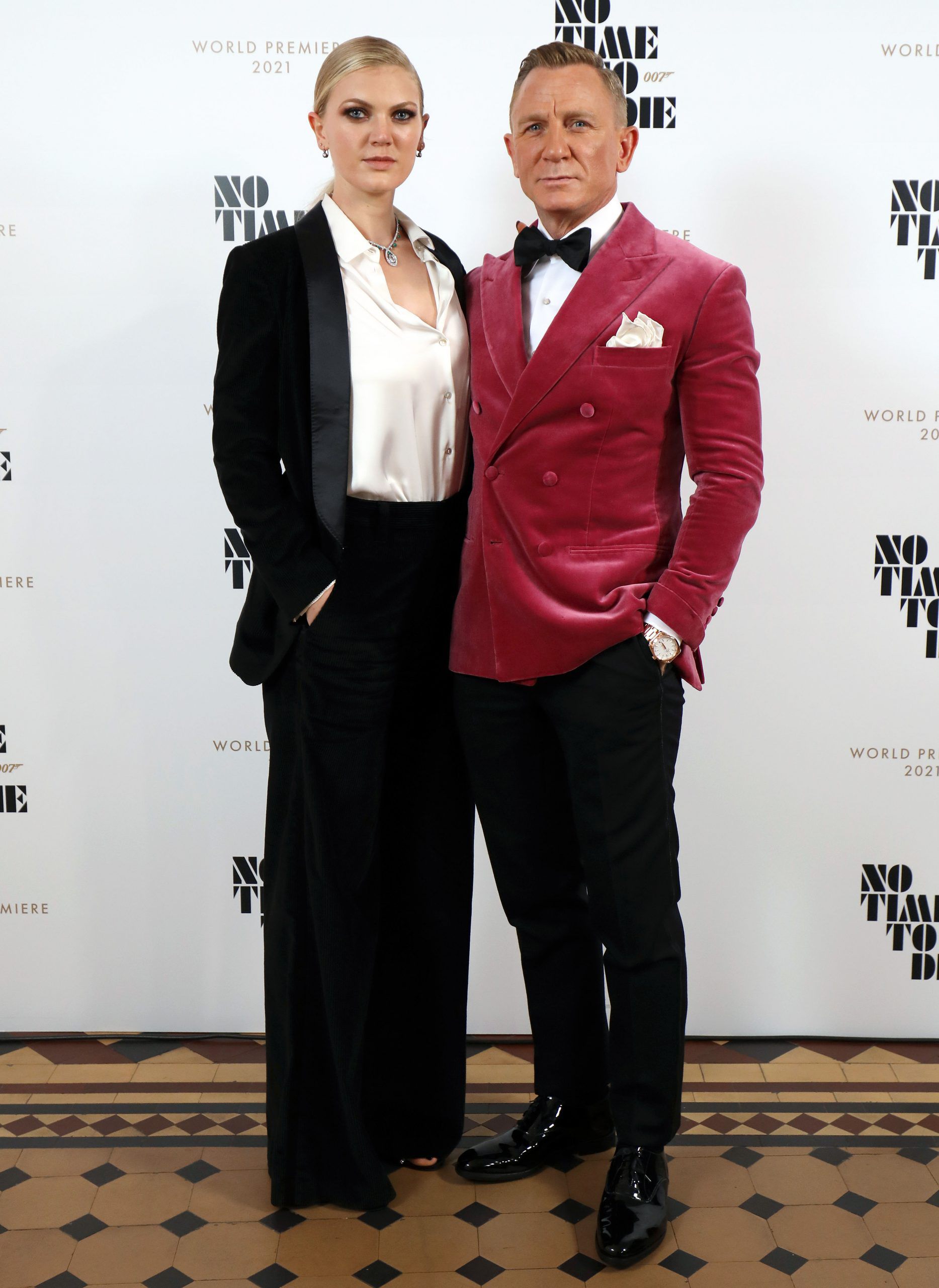 LONDON, ENGLAND - SEPTEMBER 28: (R-L) Daniel Craig and Ella Loudon, wearing Brunello Cuccinelli and Faberge at the World Premiere of "NO TIME TO DIE" at the Royal Albert Hall on September 28, 2021 in London, England.