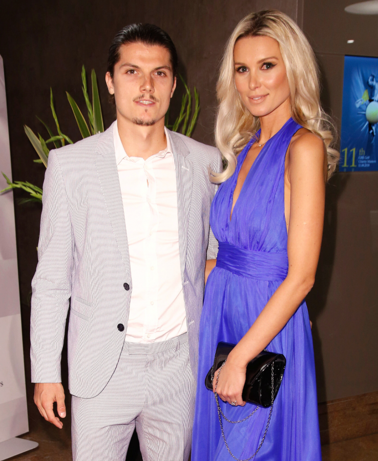 Katja Kühne in blauem Kleid und Marcel Sabitzer