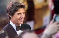Auf dem roten Teppich ist Tom Cruise ein Profi und lächelt alle Sorgen weg.