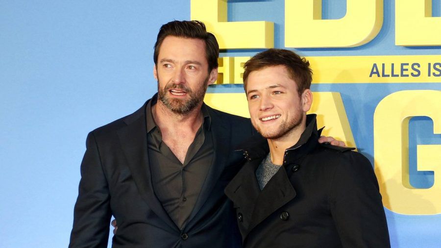 Hugh Jackman (l.) und Taron Egerton bei einer Vorführung von "Eddie the Eagle" im Jahr 2016 in München. (wue/spot)