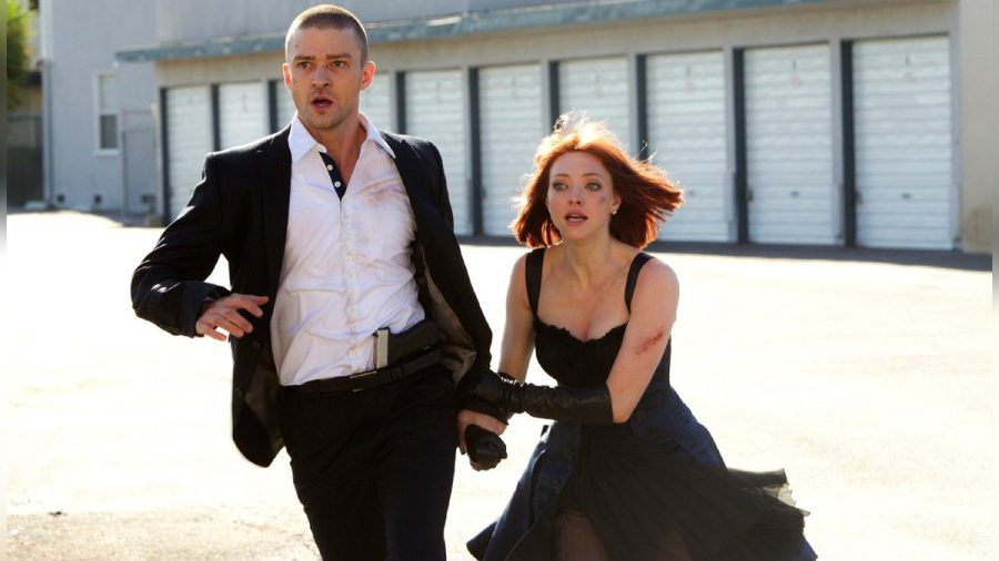 "In Time - Deine Zeit läuft ab": Die Uhr von Will Salas (Justin Timberlake) und Sylvia Weis (Amanda Seyfried) tickt. johannes.erdt
