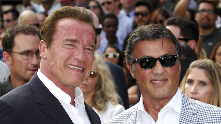 Arnold Schwarzenegger (l.) und Sylvester Stallone (r.) bei einem gemeinsamen Auftritt 2019. (ntr/spot)
