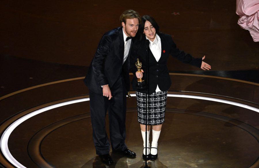 Billie Eilish and Finneas O'Connell accept the award for Best Original Song 96th Oscars - Getty BangShowbiz