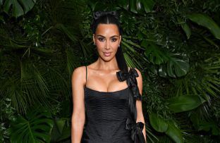 Kim Kardashian at the CHANEL and Charles Finch Pre-Oscar Awards Dinner - Getty BangShowbiz