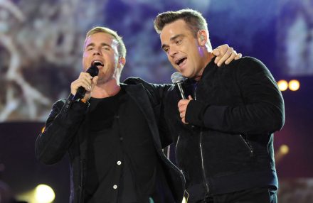 Gary Barlow and Robbie Williams perform Shame - Twickenham - 2010 - photoshot BangShowbiz