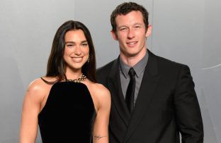 Dua Lipa and Callum Turner - March 2026 - Getty Images - Vanity Fair Oscar Party BangShowbiz