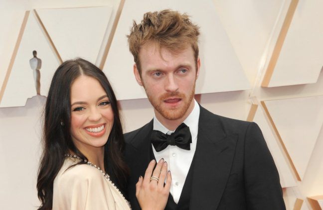 Finneas OConnell and Claudia Suleweski at Academy Awards - Photoshot - Feb 20 BangShowbiz