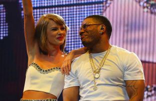 Nelly and Taylor Swift on stage together during 1989 World Tour - Getty - September 2015 BangShowbiz