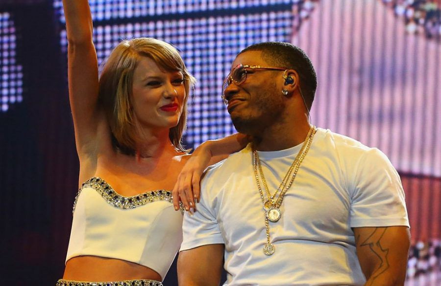 Nelly and Taylor Swift on stage together during 1989 World Tour - Getty - September 2015 BangShowbiz